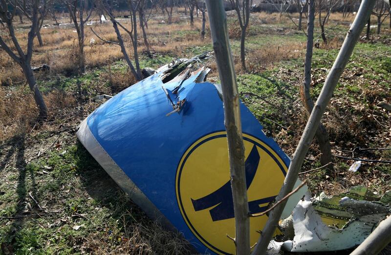 TEHRAN, IRAN - JANUARY 08: Pieces of the plane are seen at site after a Boeing 737 plane belonging to Ukrainian International Airlines crashed near Imam Khomeini Airport in Iran just after takeoff with 180 passengers on board in Tehran, Iran on January 08, 2020. All 167 passengers and nine crew members on an Ukrainian 737 plane that crashed near Iran's capital Tehran early Wednesday have died, according to a state official. (Photo by Fatemeh Bahrami/Anadolu Agency via Getty Images)