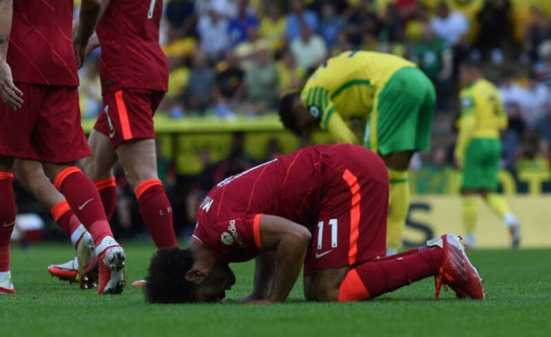 Salah celebrates  after scoring the third goal.