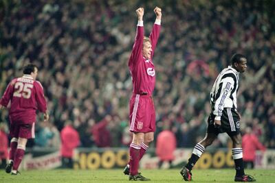 LIVERPOOL, UNITED KINGDOM - APRIL 03:  Liverpool defender John Scales celebrates on the final whistle as Faustino Asprilla (r) looks on after the 4-3 Premier League match between Liverpool and Newcastle United at Anfield on April 3, 1996 in Liverpool, England. (Photo by Stu Forster/Allsport/Getty Images)