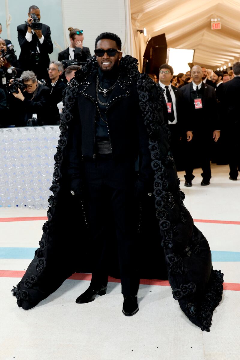 Sean 'Diddy' Combs in a floral black cape by June Ambrose. AFP