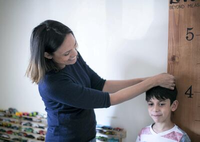 DUBAI, UNITED ARAB EMIRATES.  4 FEBRUARY 2021. 
Amanda Dias has completed a few DIY projects with her sons, Dwayne and Evan, like this height board she made to measure the growth of her sons.
Photo: Reem Mohammed / The National
Reporter: