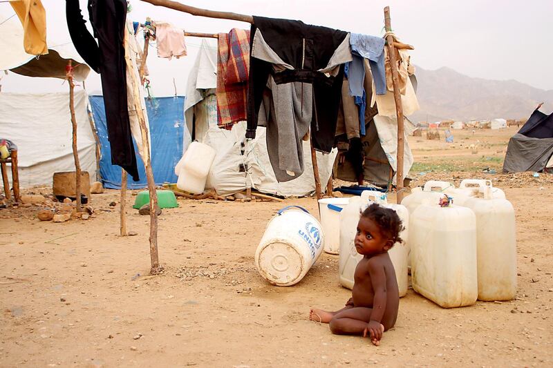 A displaced Yemeni child who fled the fighting is pictured at a makeshift camp in the district of Abs, in the country's northwestern Hajjah province. AFP