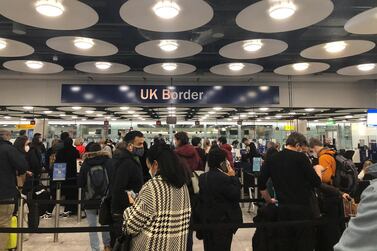 People queue at Terminal 5 of Heathrow Airport. Pia Josephson via Reuters 