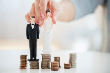 Experts and couples agree that honesty and a system of checks and balances are essential to reach long-term financial goals. Getty Images