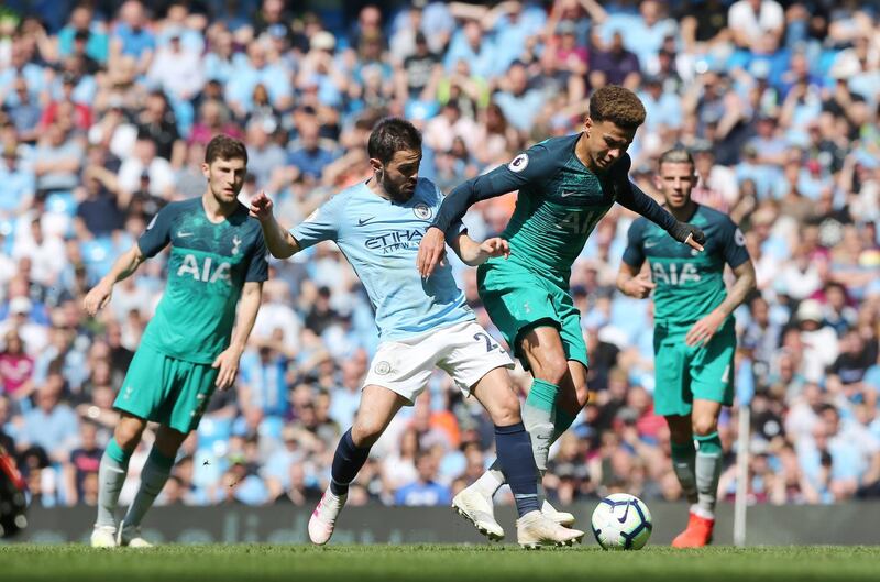 Tottenham Hotspur's Dele Alli, right, in action against Manchester City's Bernardo Silva. EPA