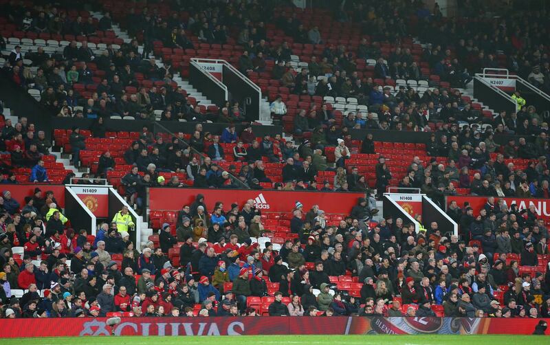 Empty seats are seen around Old Trafford during Manchester Uited's match against Burnley. Getty Images