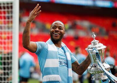 Soccer Football - FA Cup Final - Manchester City v Watford - Wembley Stadium, London, Britain - May 18, 2019  Manchester City's Raheem Sterling celebrates with the trophy after winning the FA Cup  Action Images via Reuters/John Sibley