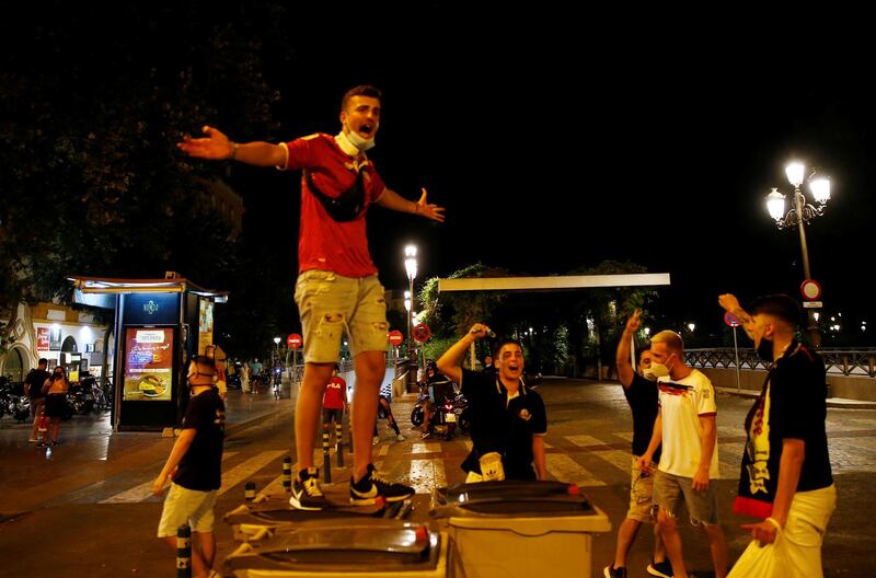 Sevilla fans celebrate in Seville. Reuters