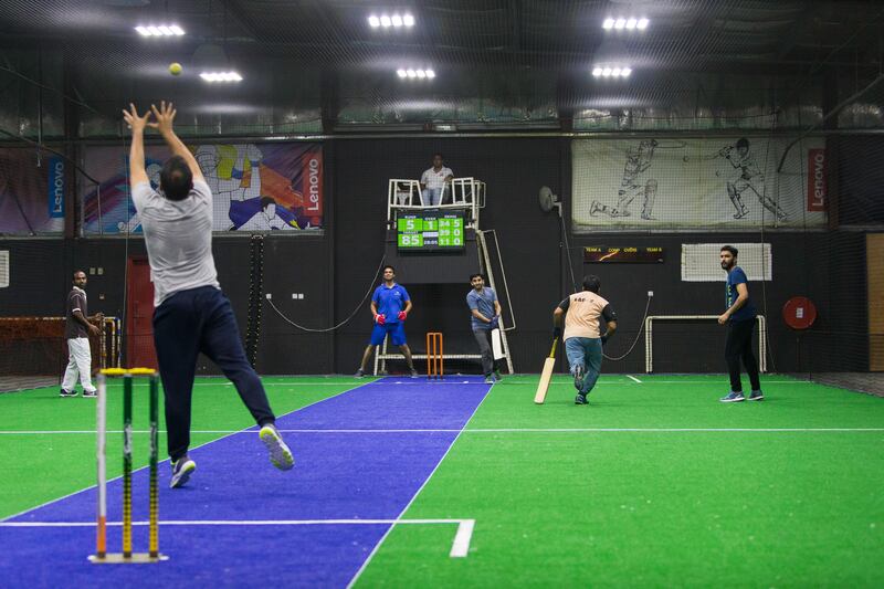 Dubai, United Arab Emirates, July 18, 2017:    A group of men play pick-up indoor cricket at the Insportz Club in the Al Quoz area of Dubai on July 18, 2017. Christopher Pike / The National

Reporter: Paul Radley
Section: Sport