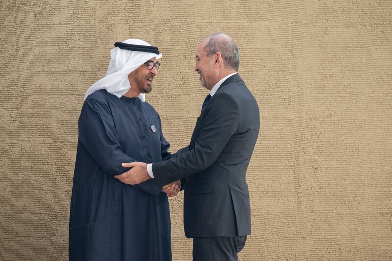 President Sheikh Mohamed greets Jordan's Foreign Minister, Ayman Safadi. Eissa Al Hammadi / UAE Presidential Court 