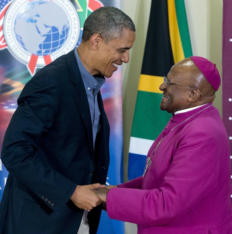 US president Barack Obama chats with Archbishop Desmond Tutu following a tour of the Desmond Tutu HIV Foundation Youth Centre in Cape Town, South Africa. AFP