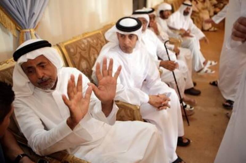 Sept 28, 2011 (Abu Dhabi)  Awana al Musabi, left, and Saif al Khairi speak fondly about Awana's son Theyab Awana a football player on the UAE national team who was killed in a car accident Abu Dhabi September 28, 2011. (Sammy Dallal / The National)