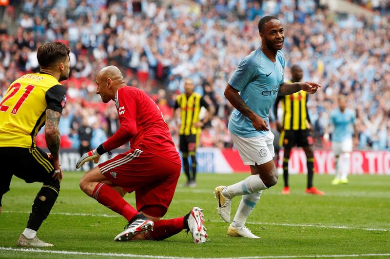 Manchester City's Raheem Sterling celebrates scoring his first of the afternoon and City's second in the FA Cup final against Watford at Wembley. Reuters