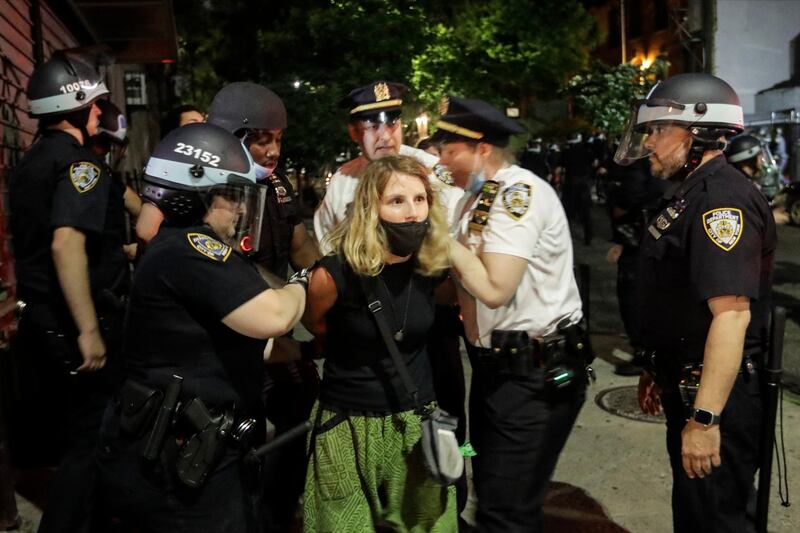 Police officers arrest protesters near Barclays Centre in the Brooklyn borough of New York on May 29, 2020. AP Photo
