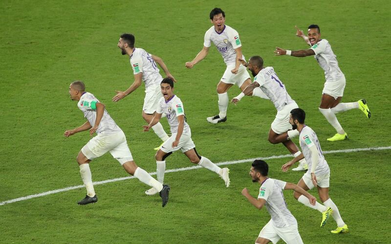 Al Ain players celebrate winning the penalty shootout. Reuters
