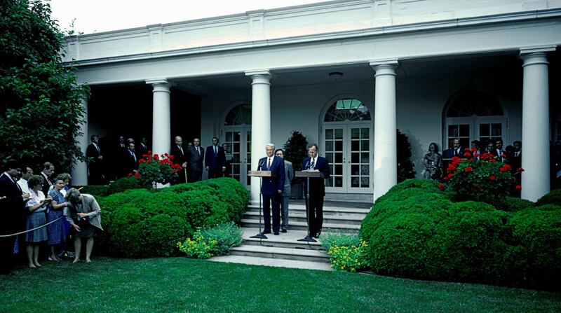 Russian President Boris Nikolaevich Yeltsin (1931 - 2007), left, stands next to US President George HW Bush (1924 - 2018) at the White House's Rose Garden, Washington, DC, June 16, 1992. (Photo by Mark Reinstein/Corbis via Getty Images)