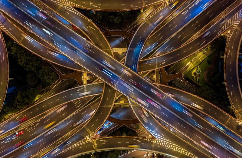 This aerial picture shows traffic on an elevated intersection in downtown Shanghai. AFP