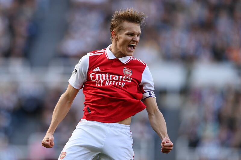 Martin Odegaard celebrates after scoring Arsenal's opening goal against Newcastle United at St James Park on May 7, 2023. Getty