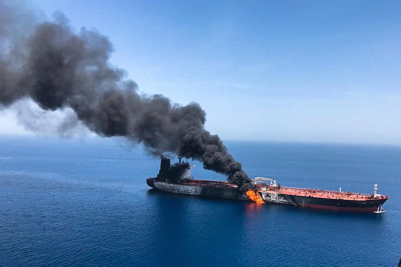 FILE - In this Thursday, June 13, 2019 file photo, an oil tanker is on fire in the sea of Oman. A series of attacks on oil tankers near the Persian Gulf has ratcheted up tensions between the U.S. and Iran -- and raised fears over the safety of one of Asiaâ€™s most vital energy trade routes, where about a fifth of the worldâ€™s oil passes through its narrowest at the Strait of Hormuz. The attacks have jolted the shipping industry, with many of operators in the region on high alert. (AP Photo/ISNA, File)
