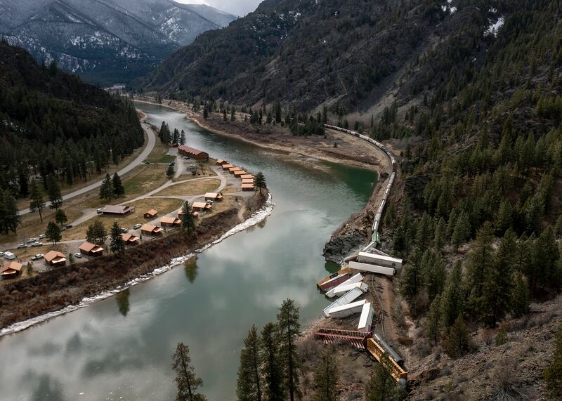 A train sits derailed near Quinn's Hot Springs Resort west of St.  Regis, Mont. , Sunday, April 2, 2023.  Montana Rail Link is investigating the derailment in which there were no injuries reported.  (Ben Allan Smith / The Missoulian via AP)