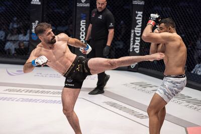 Iran's Amir Fazli, left, clinched victory over Brazilian Juscellino Ferreira to win the vacant middleweight title. Photo: UAE Warriors