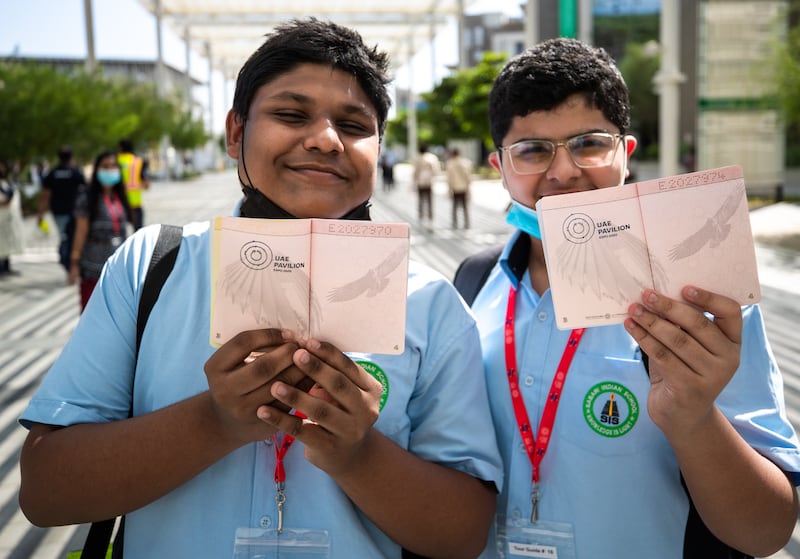 Collecting stamps in their Expo passports is a favourite activity for many pupils. Victor Besa/The National.