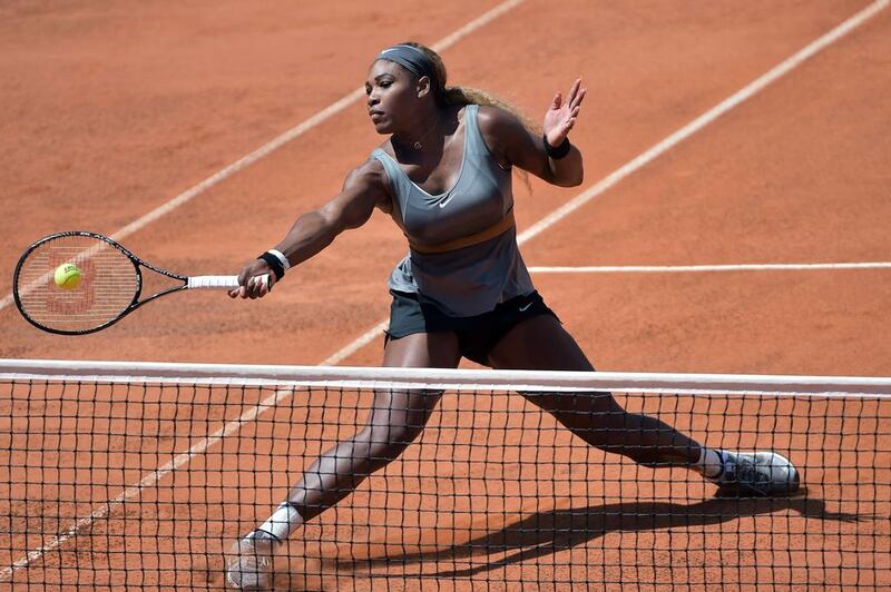Serena Williams of the US returns a ball during the WTA Rome's Tennis Masters final against Sara Errani of Italy on May 18, 2014, at the Foro Italico in Rome. Williams won 6-3, 6-0. AFP PHOTO / GABRIEL BOUYS