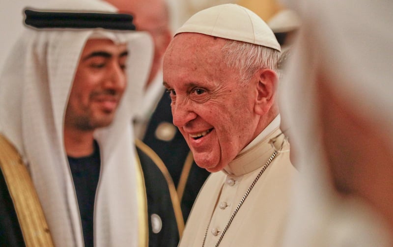 Pope Francis smiles upon his arrival at the Abu Dhabi airport. AP Photo