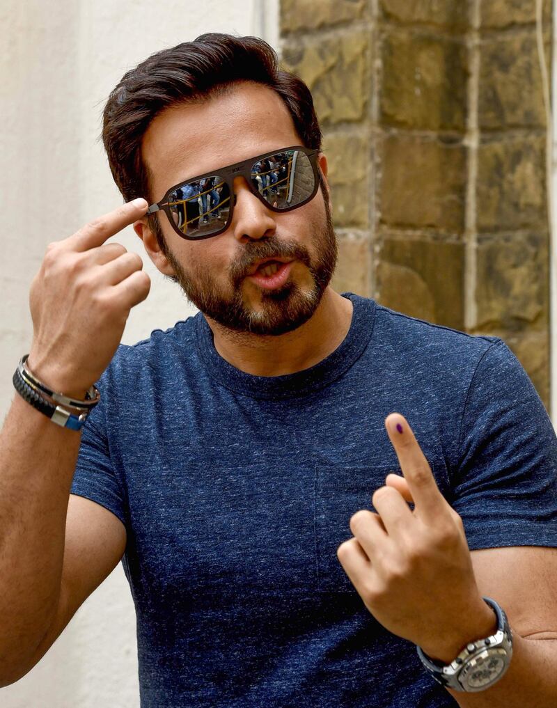 Bollywood actor Emraan Hashmi poses for photographs after casting his vote at a polling station in Mumbai on April 29, 2019. AFP
