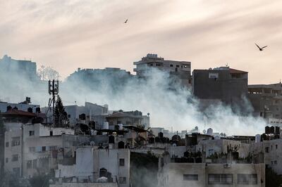 Smoke billows during an Israeli army raid in a refugee camp in Jenin on Tuesday. AFP