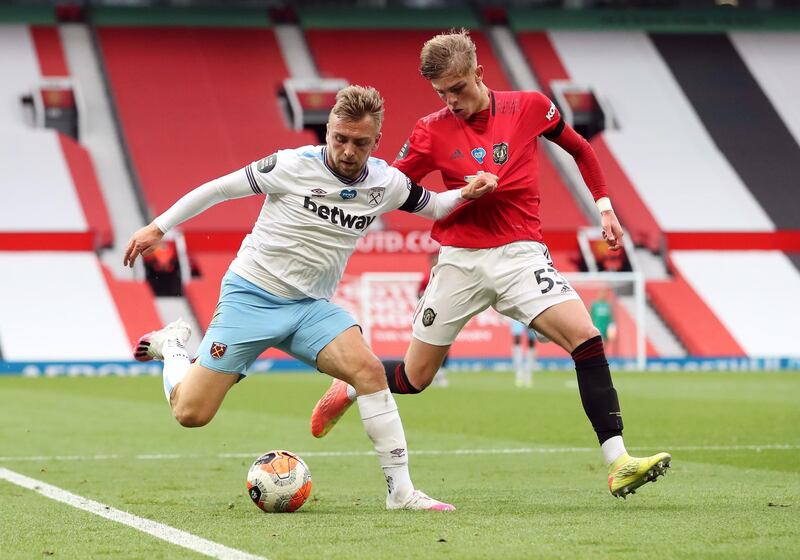 Manchester United's Brandon Williams in action with West Ham United's Jarrod Bowen. Reuters