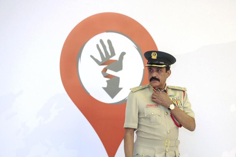 Major General Khamis Al Muzeina, Commander-in-Chief of Dubai Police, attends the Conference of Combating Human Trafficking Through Mediation Agencies and Employing Proper Capabilities at the JW Marriott Marquis in Dubai. Sarah Dea / The National

