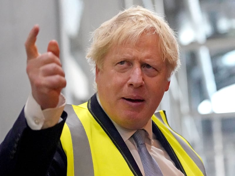 British Prime Minister Boris Johnson remains defiant on a visit to the Blackpool Transport bus depot in north-west England. He could face a leadership challenge this week. Reuters