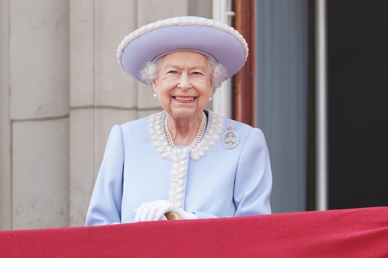 Queen Elizabeth II wore a summery shade of light blue to watch the Trooping the Colour parade. PA