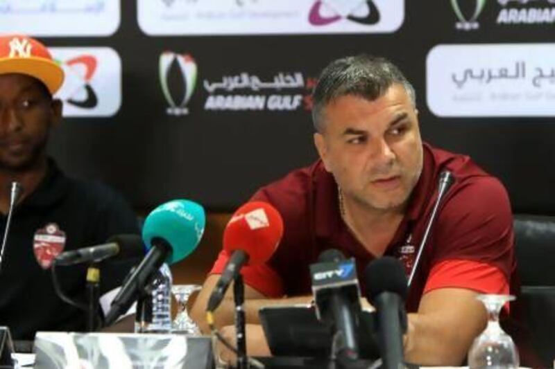 The Al Ahli coach Cosmin Olaroiu talks to the media ahead of tonight's Super Cup match against Al Ain. Ravindranath K / The National