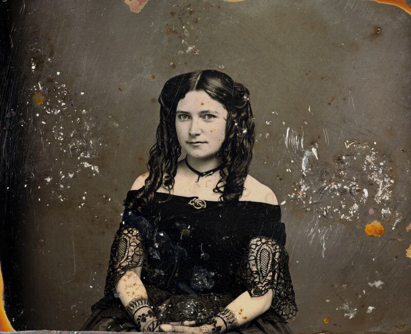 A daguerreotype metal plate photograph of an unidentified young woman who the scientific mission recovery team nicknamed 'Mona Lisa of the Deep.'