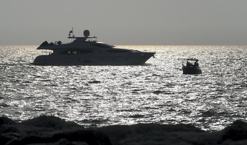 Dubai, United Arab Emirates - Reporter: N/A. News. The sun sets on a yacht on the longest day of the year. Sunday, June 21st, 2020. Dubai. Chris Whiteoak / The National