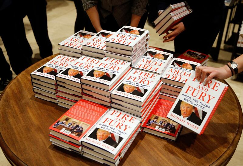 FILE - In this Tuesday, Jan. 9, 2018, file photo, copies of Michael Wolff's "Fire and Fury: Inside the Trump White House" on display as they go on sale at a bookshop, in London. North Korea has found good material to attack President Donald Trump: Michael Wolff's bombshell new book, "Fire and Fury." (AP Photo/Alastair Grant, File)