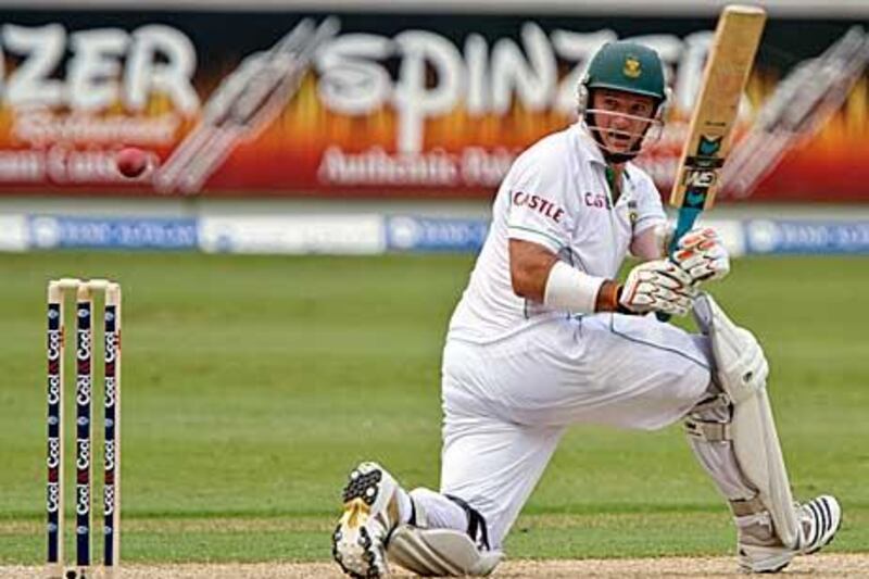 Graeme Smith sweeps the ball fine off the bowling of Abdur Rehman during the first day's play in Dubai.