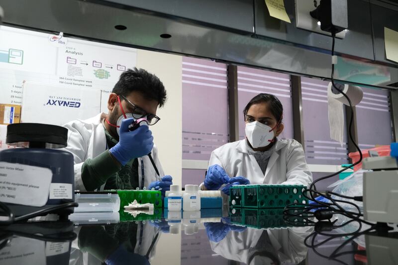 Samples are tested at a Covid-19 genome sequencing lab in New Delhi. Bloomberg