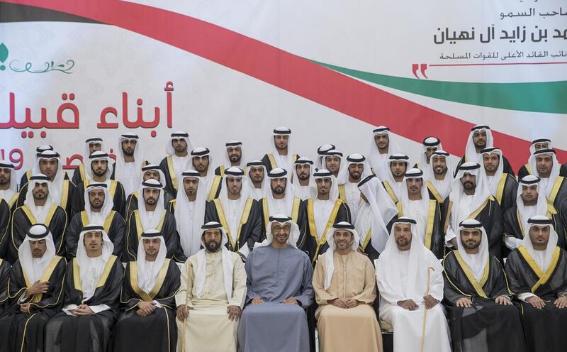 Sheikh Mohammed bin Zayed, front row fifth right, with the grooms. With him are Sheikh Tahnoon bin Mohammed, front row sixth right, Sheikh Abdulaziz bin Humaid bin Rashid Al Nuaimi, front row fourth right, and Bakhit bin Suaidan Al Nuaimi, front row third right. Mohamed Al Hammadi / Crown Prince Court - Abu Dhabi