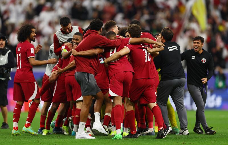 Qatar players celebrate after the shoot-out. Reuters 