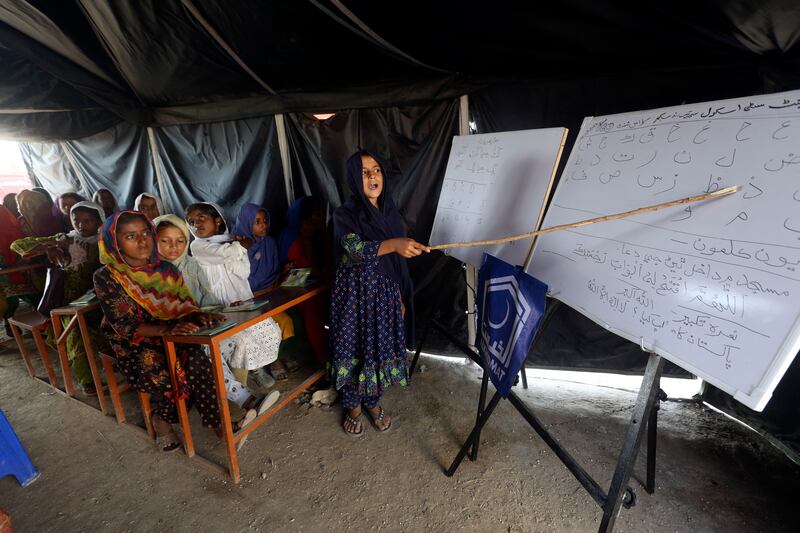 Children attend classes in Sukkur. AP