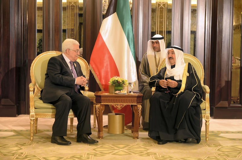 KUWAIT CITY, KUWAIT - NOVEMBER 19: In this handout photo provided by the PPO, Palestinian President Mahmoud Abbas (L) meets with Emir of Kuwait Sabah Al-Ahmad Al-Jaber Al-Sabah during the Arab-African Summit November 19, 2013 in Kuwait City, Kuwait. Leaders gathered for the two-day summit to discuss economic ties between Africa and the Gulf. (Photo by Thaer Ghanaim/PPO via Getty Images)