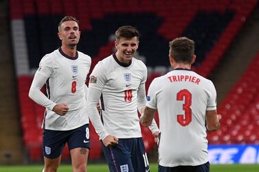 Mason Mount, centre, celebrates after scoring what proved to be the winning goal for England against Belgium. AFP 