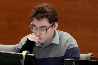 Marjory Stoneman Douglas High School shooter Nikolas Cruz is shown at the defense table during the penalty phase of Cruz's trial at the Broward County Courthouse in Fort Lauderdale on Tuesday, Oct.  4, 2022.  Cruz previously plead guilty to all 17 counts of premeditated murder and 17 counts of attempted murder in the 2018 shootings.  (Amy Beth Bennett / South Florida Sun Sentinel via AP, Pool)