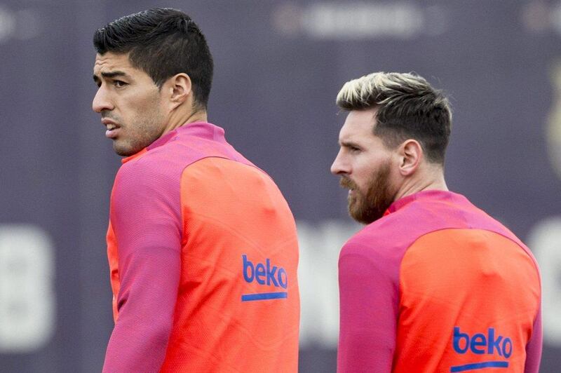 Luis Suarez, left, and Lionel Messi during their time together at Spanish club Barcelona. EPA