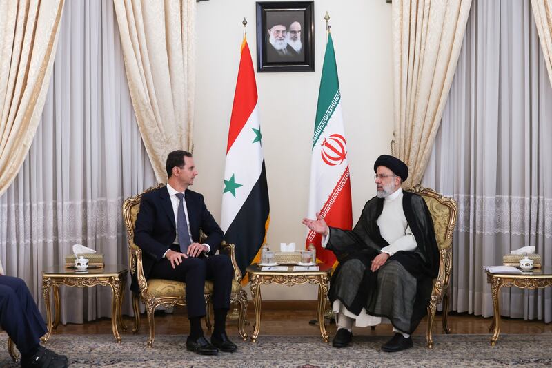 Iran's President Ebrahim Raisi meets Syrian President Bashar Al Assad in Tehran on May 8, 2022. Reuters