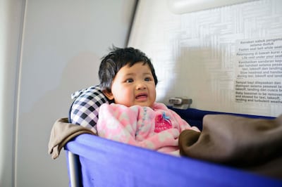 baby's first experience on a plane. Getty Images
