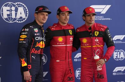 Charles Leclerc (C) of Ferrari celebrates the pole position with his teammate Carlos Sainz (R), third and Max Verstappen of Red Bull, second. EPA